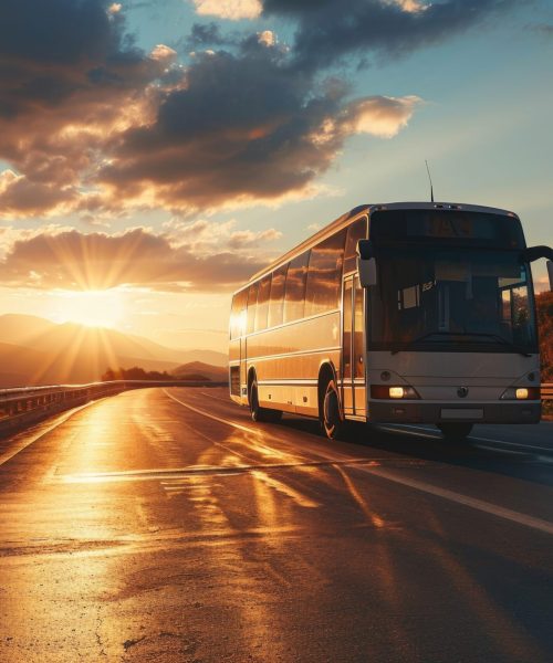 comfortable-tourist-bus-traveling-sunset