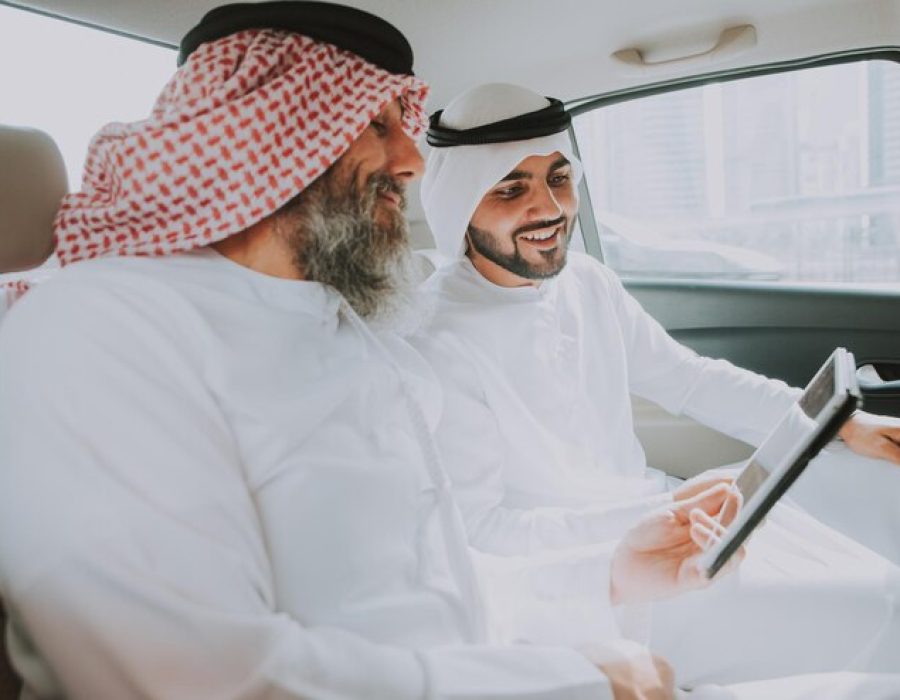 men-wearing-dish-dash-traveling-car_1048944-2079835