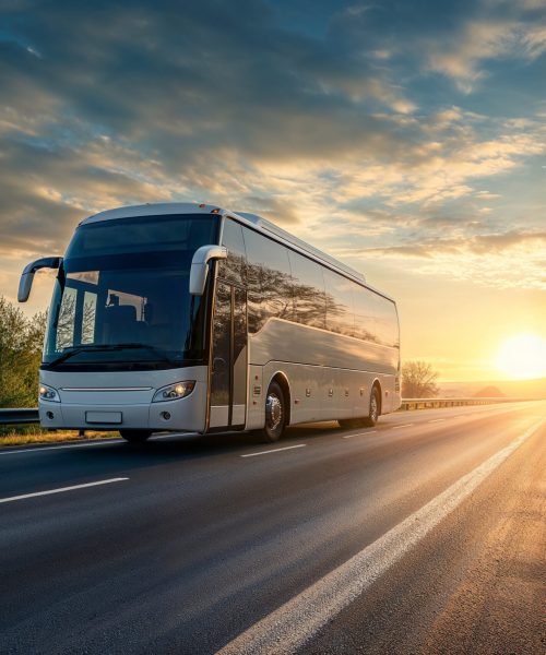 modern-white-intercity-bus-scenic-highway-with-warmth-sunset-perfect-longdistance-travel-countryside-touring