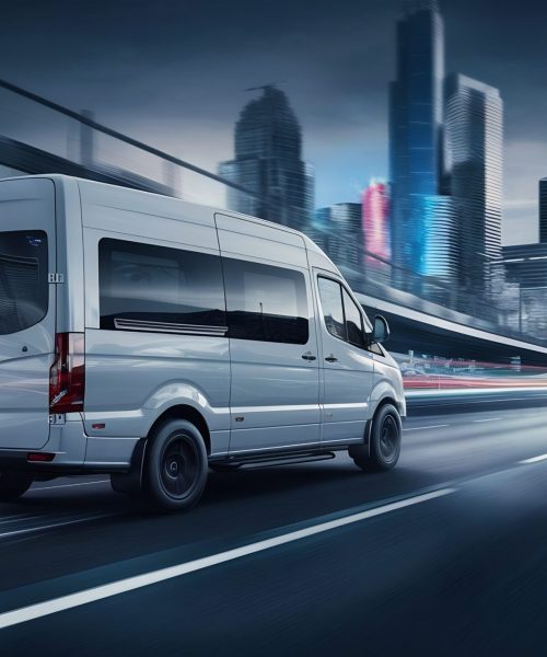 white-van-moving-fast-highway-with-modern-city
