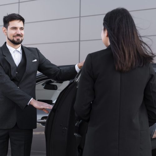 young-male-being-uber-driver-female-client